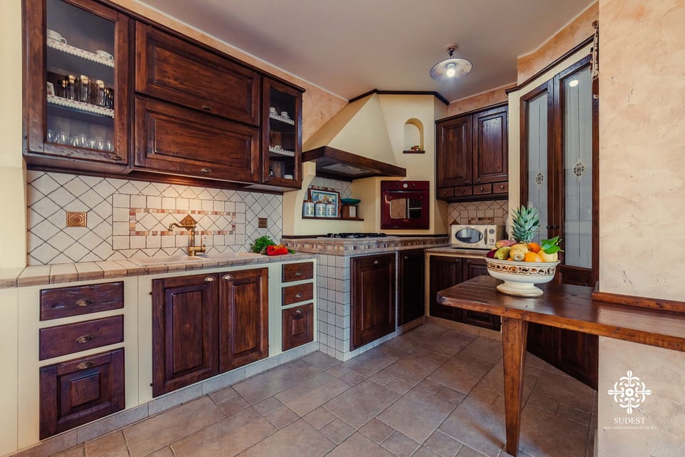 Luxury Villa | Private kitchen | Full-size fridge, microwave, oven, stovetop