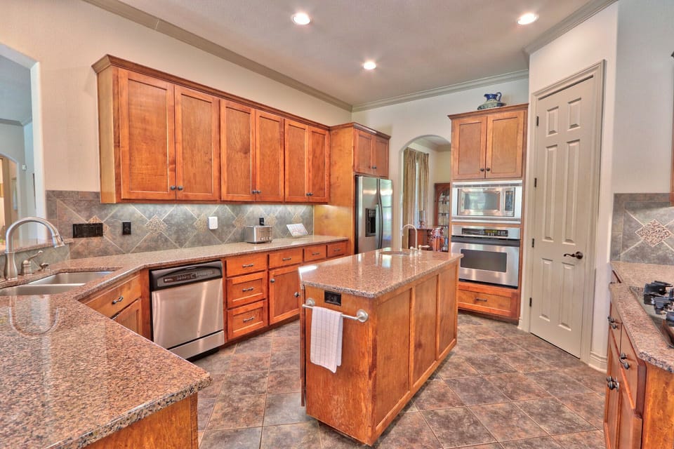 Full kitchen with stainless steel appliances