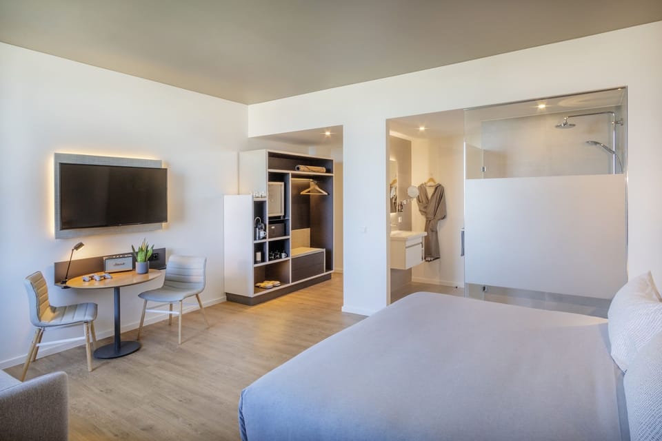 Premium bedding, memory foam beds, minibar, in-room safe