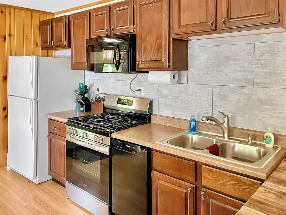 A well-stocked kitchen & new convection range (2024). 