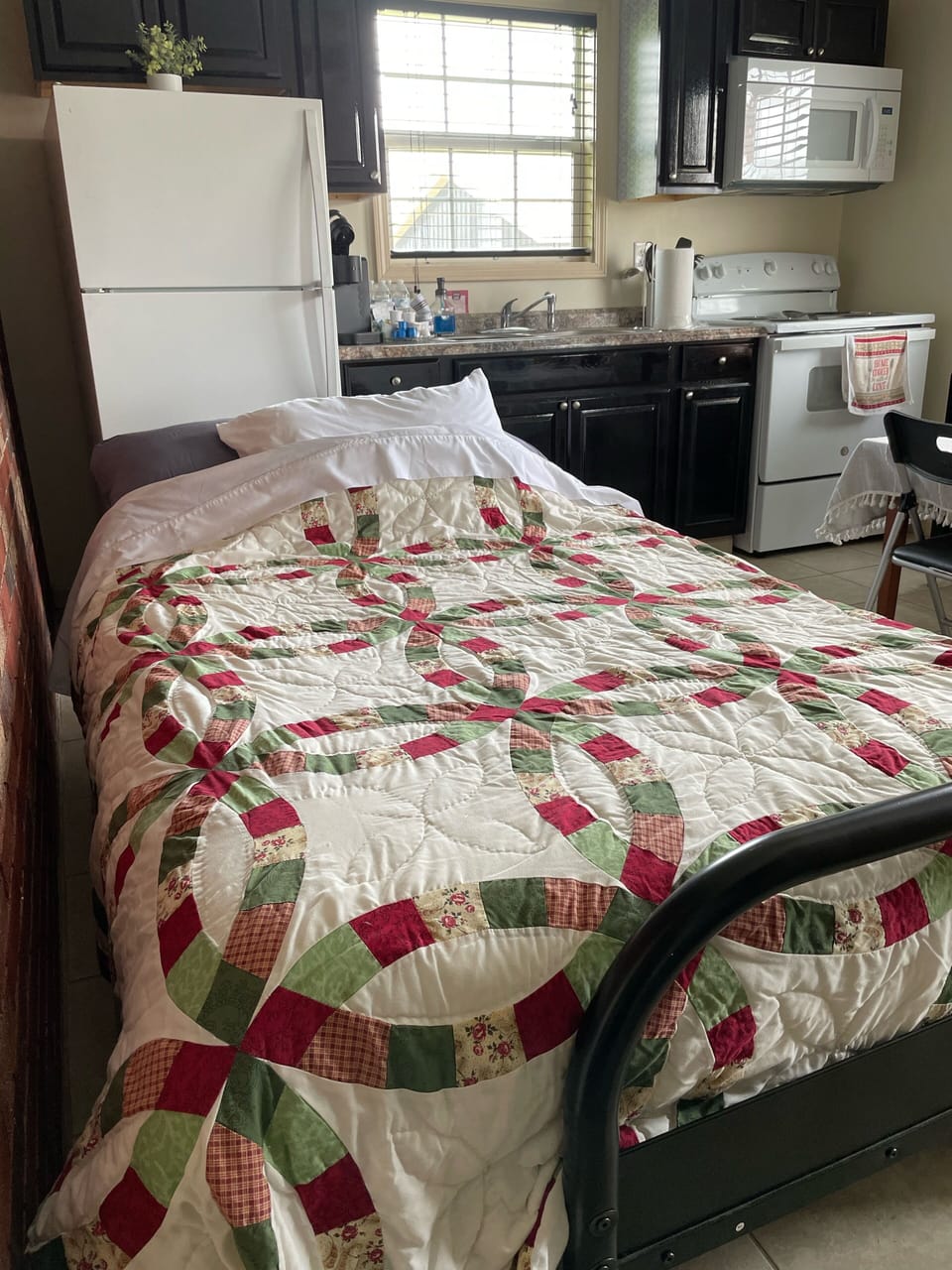 Futon in the back off the master bedroom can be made into a full bed 