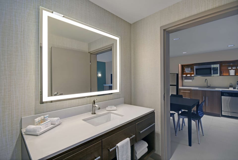 Shower, rainfall showerhead, towels