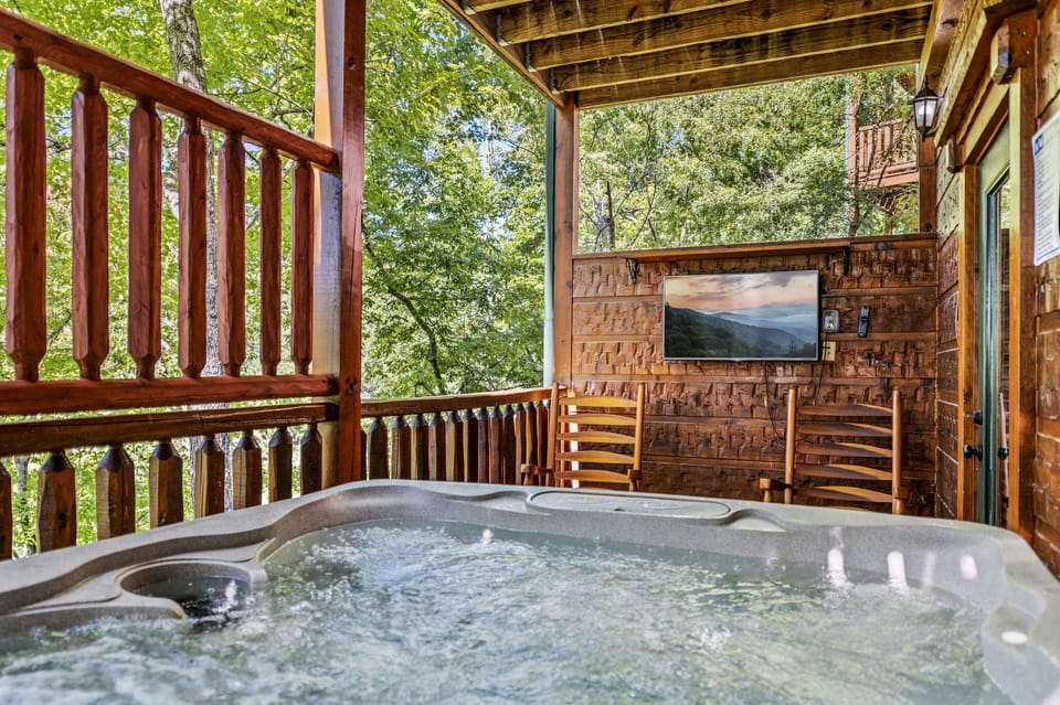 Relax in the 7 person hot tub while watching your favorite show!