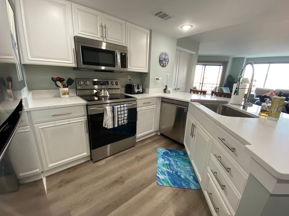 New quartz countertop and stainless sink 