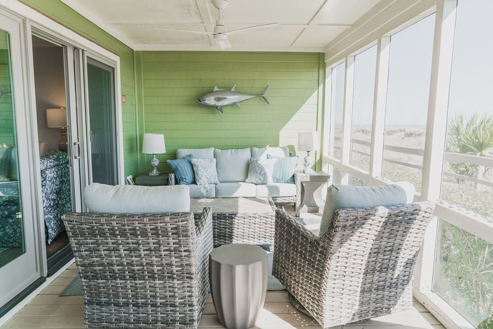 Large oceanfront porch with upscal comfy furniture