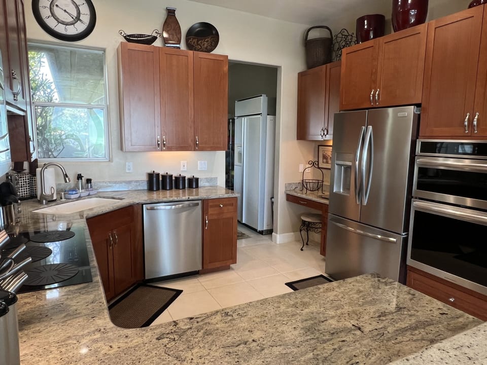 Brand new appliances plus a second refrigerator in adjoining laundry room