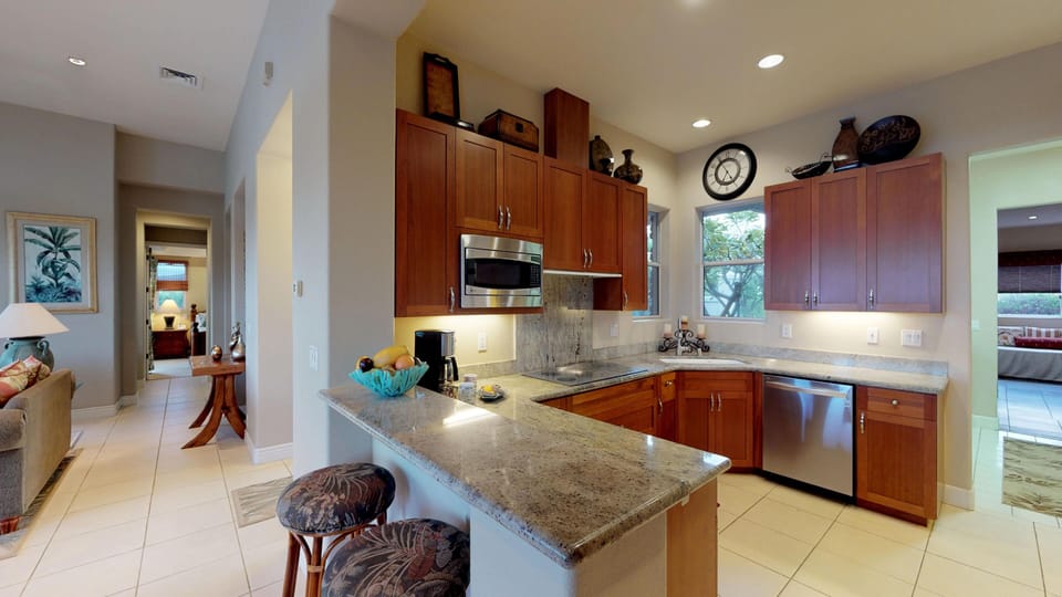 New cabinets with upgraded granite counter tops off of family room