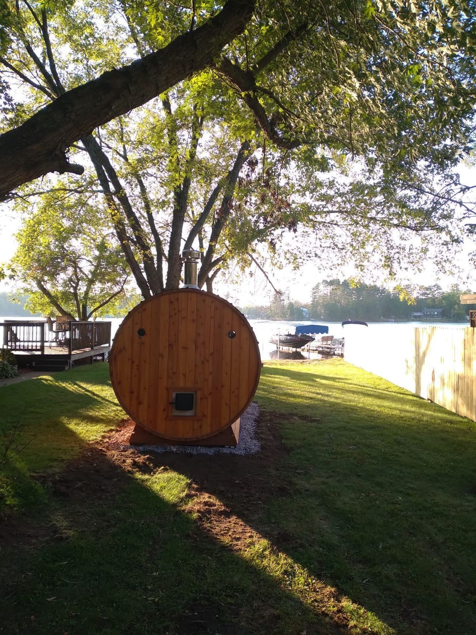 Wood fired fed stove from outside rear of sauna.