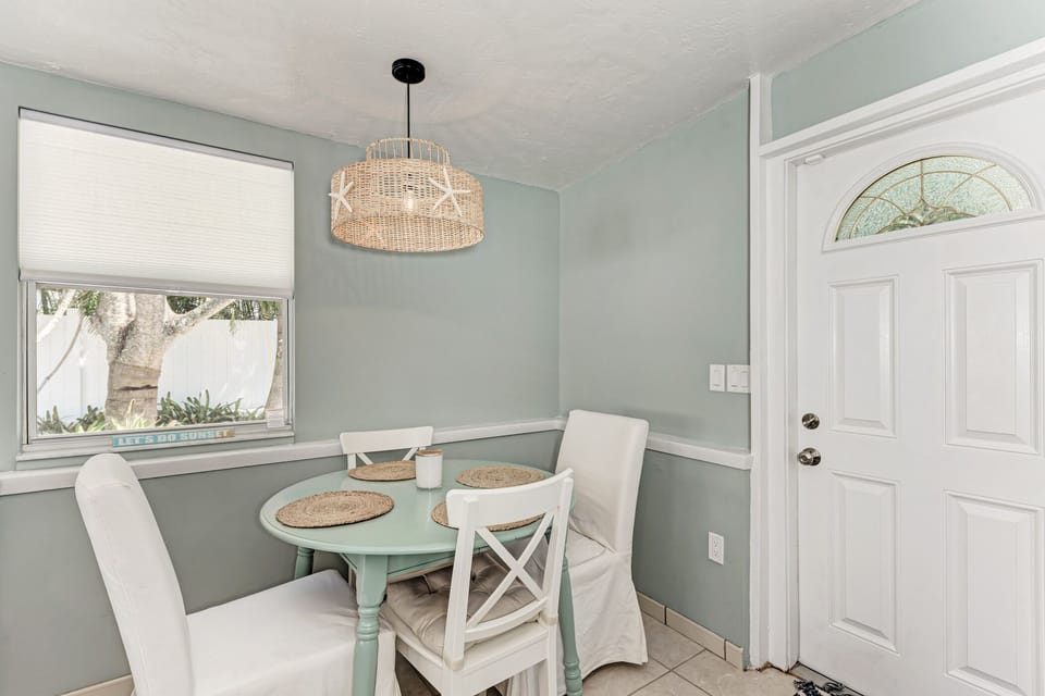 Dining room table sits right next to the back door