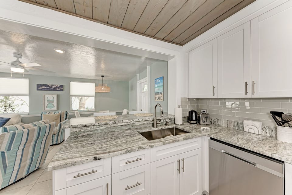 Kitchen facing towards the dining and family room