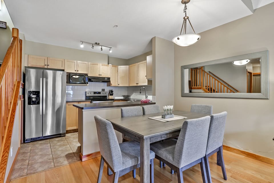 Enjoy dinner for up to 6 at the table and comfy chairs.