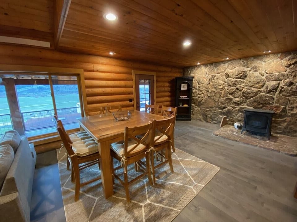 Another large dining table off the main living room.