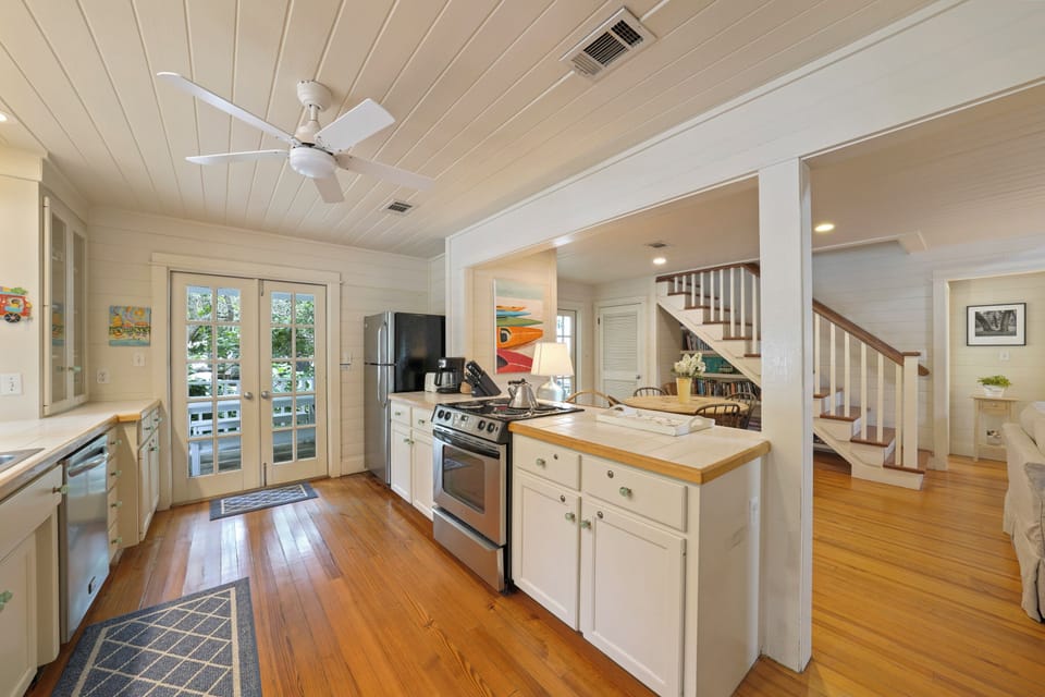 KITHCEN VIEW FACING DINING AND STAIRCASE