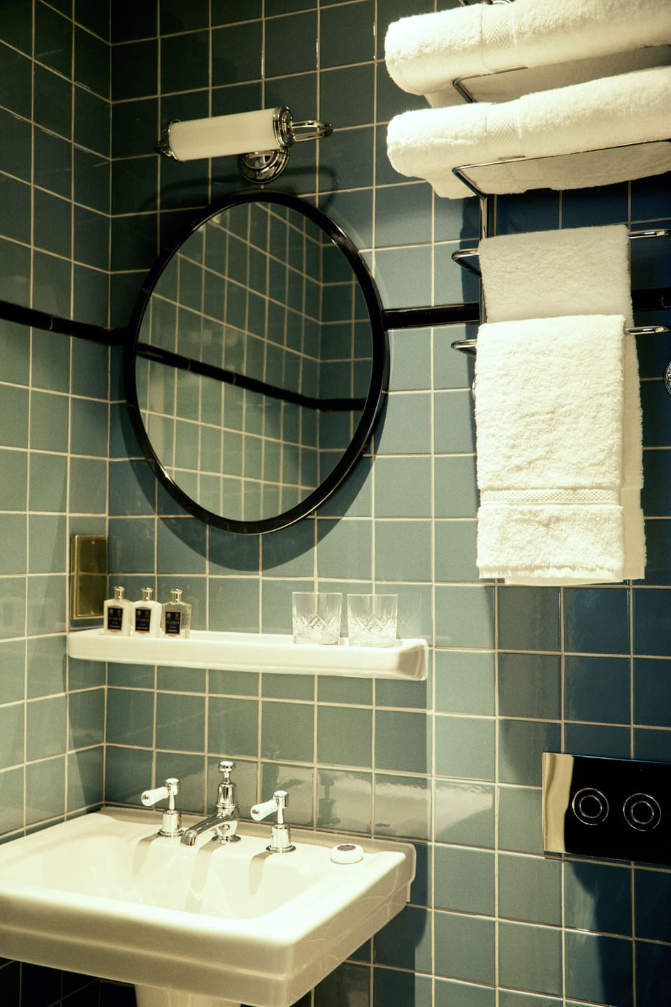 Deluxe Room | Bathroom | Designer toiletries, hair dryer, slippers, towels