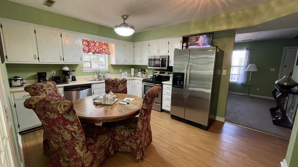 Kitchen with a dining table in the first floor.