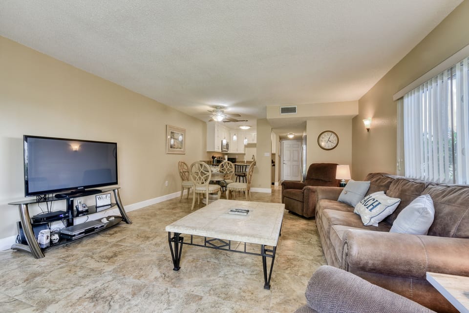 Living Room - pool side unit, ocean view balcony, private beach access, Indialantic, FL