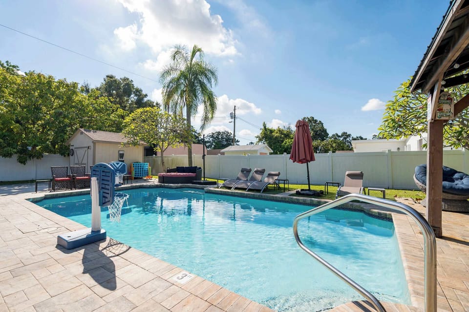 Splash into your vacation! Enjoy a dip in the private pool with a basketball hoop, or soak up the sun on a comfy lounge chair. 