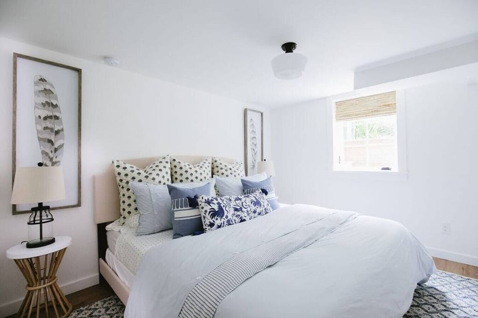 Spacious bedroom with king size bed and walk-in closet.