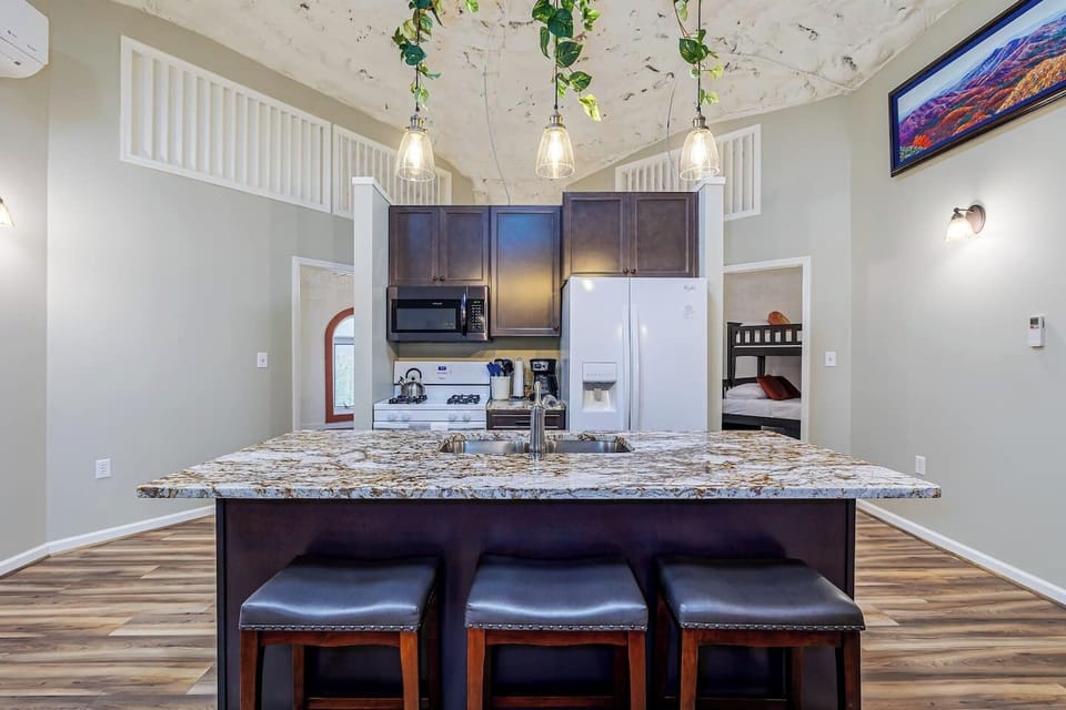 Full kitchen available with gas stove, refrigerator, microwave, pots, pans, dishes, etc.   Cook a great meal inside or outside on the gas grill!