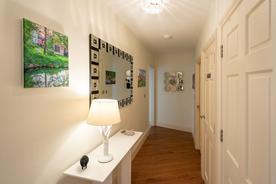 Hallway with coat storage and a warm welcome as you arrive.