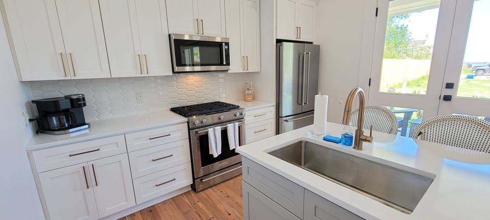 Kitchen with gas range.