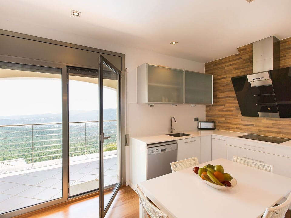 Building, Cabinetry, Furniture, Countertop, Wood, Kitchen Appliance, Kitchen, Kitchen Stove, Floor