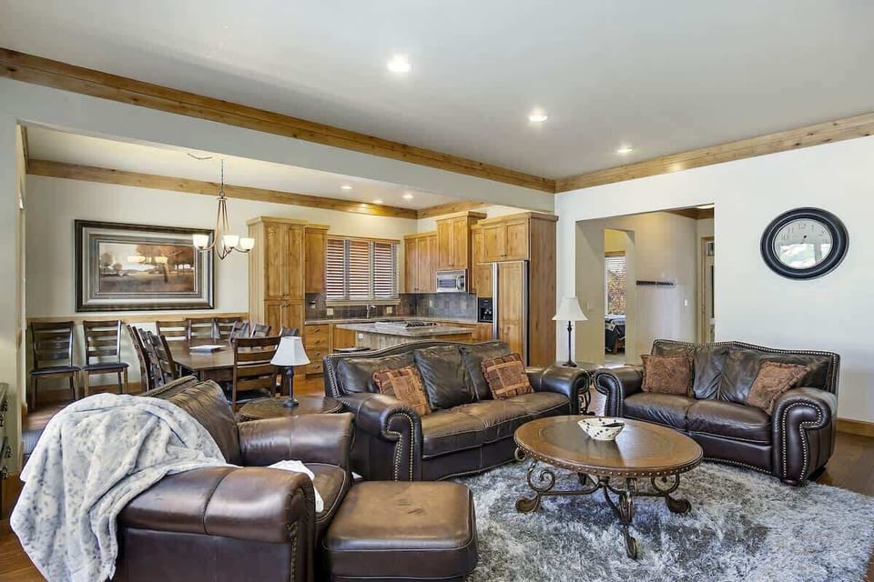 Main level great room with dining and kitchen