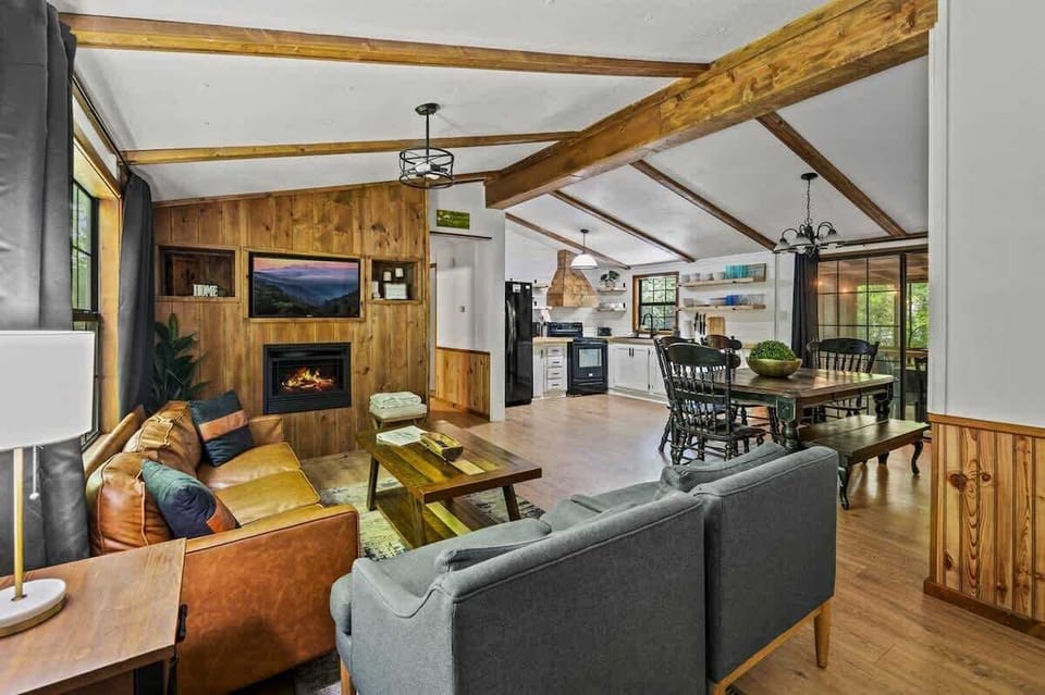 Open, free-flowing space combining living room, dining, and kitchen—make yourself at home!