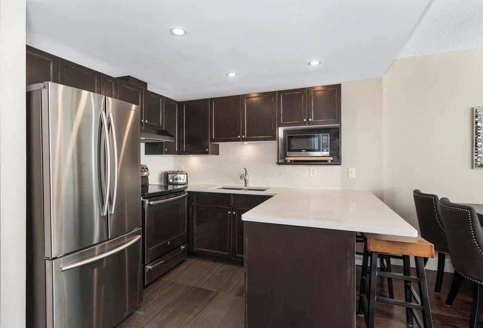 Contemporary kitchen with stainless steel appliances