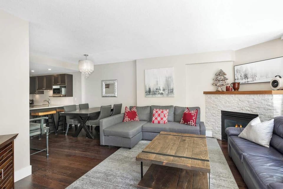 Spacious living area with comfortable seating and a sofa trundle bed 