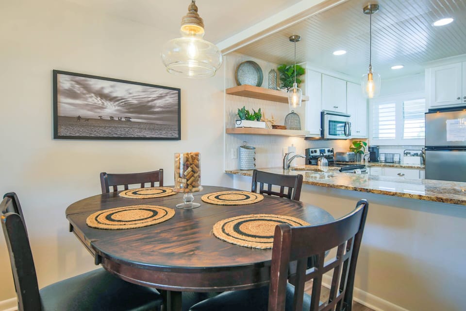 Walking on Sunshine features a beautifully renovated kitchen that opens onto the dining area.