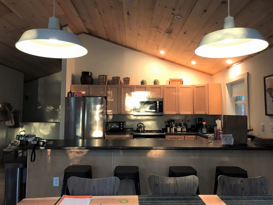 Kitchen island is a perfect spot to hang out with the cook!