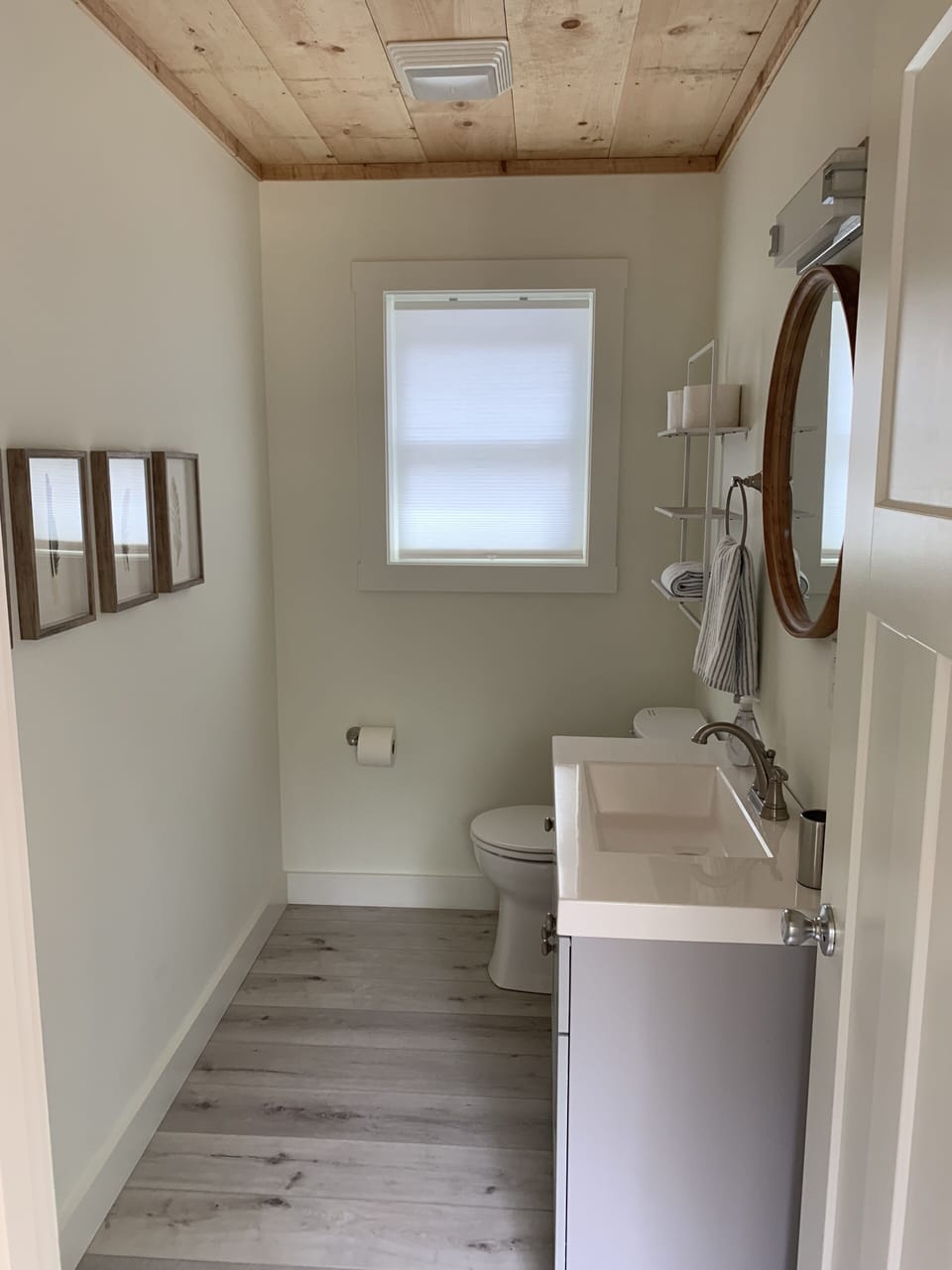 Upstairs 1/2 bath between bedrooms. Full bath on first floor too.