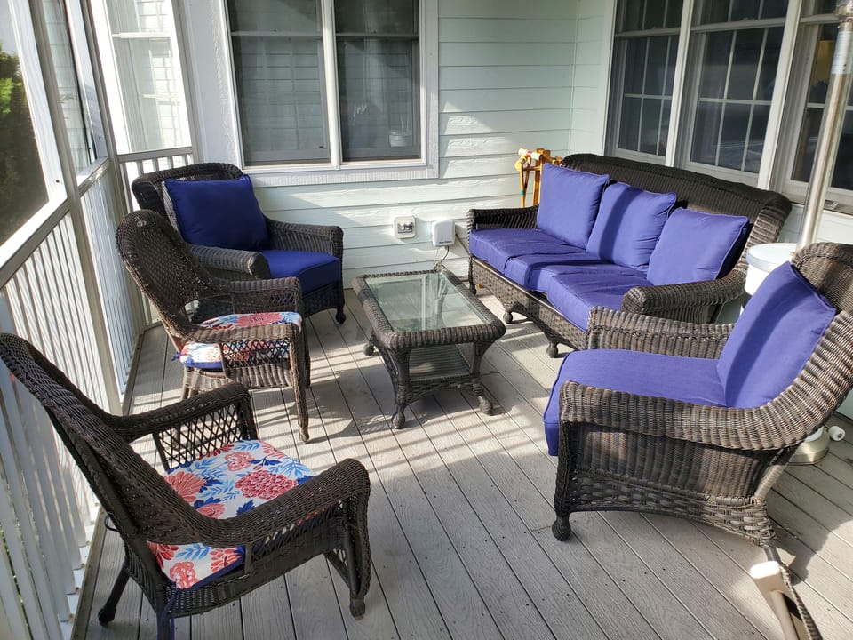 Screened-in porch in the back of house. Perfect for morning coffee!
