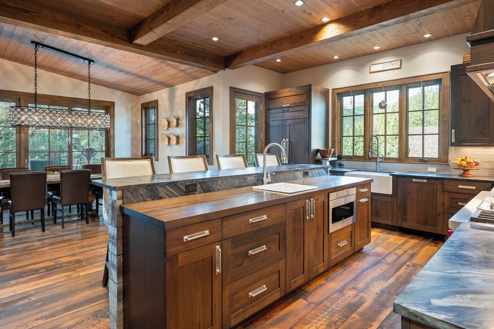The dining room flows into the gourmet kitchen