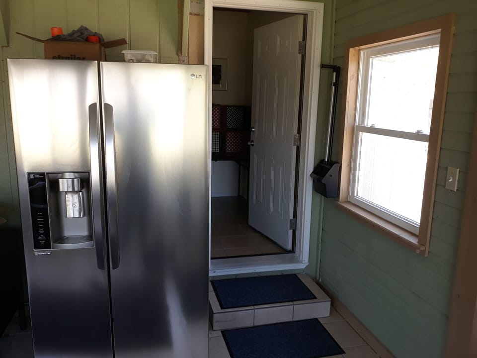 Access to master bathroom from pool. Bathroom can be locked from both sides. 
