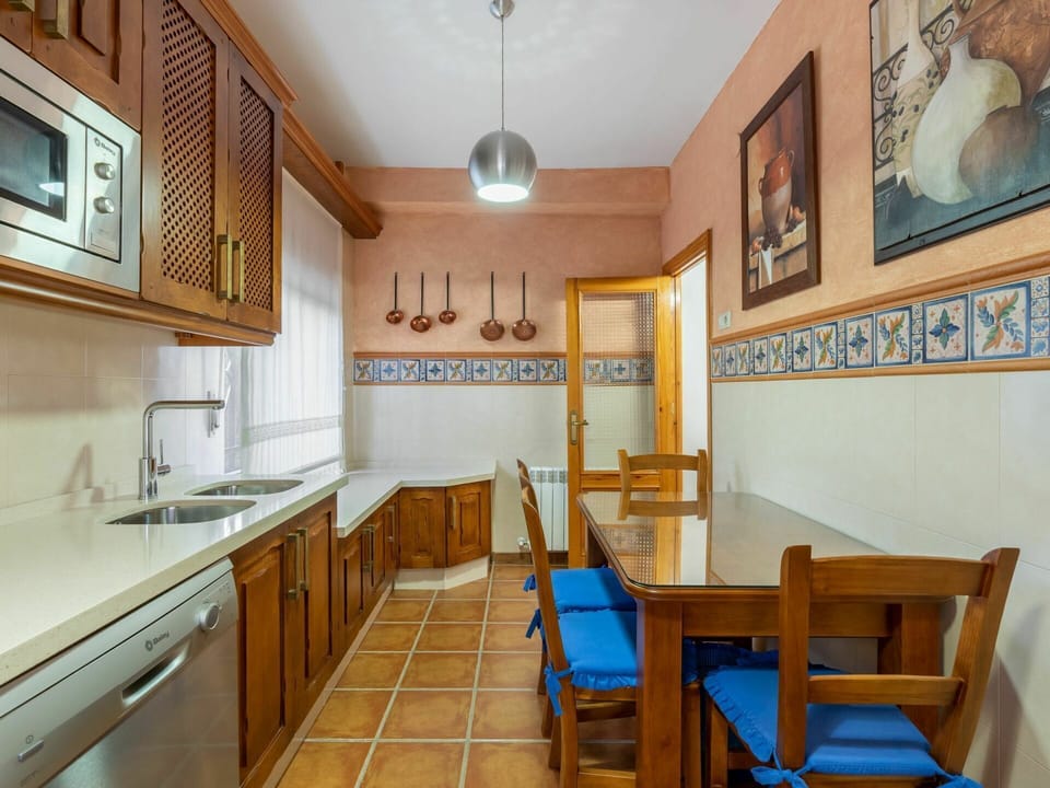 Cabinetry, Property, Furniture, Sink, Kitchen Sink, Countertop, Picture Frame, Wood, Chair, Interior Design