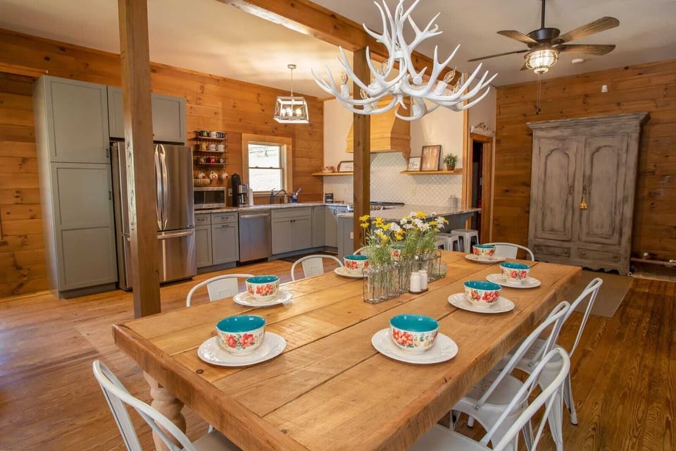 Dining Table seats eight guests, plus bar stool seating at the Kitchen bar top