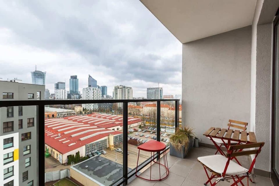 Furnished balcony which provides a comfortable space to spend time outdoors.