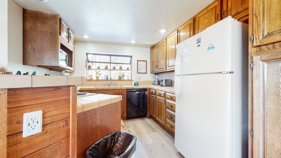 Indoors, Kitchen, Hardwood, Refrigerator, Cabinet