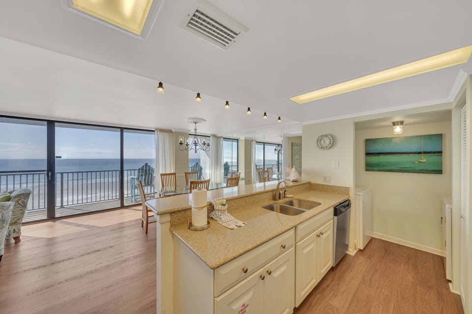 The kitchen features updated countertops & cabinets, stainless-steel appliances, and has everything you need to prepare meals for family & friends.