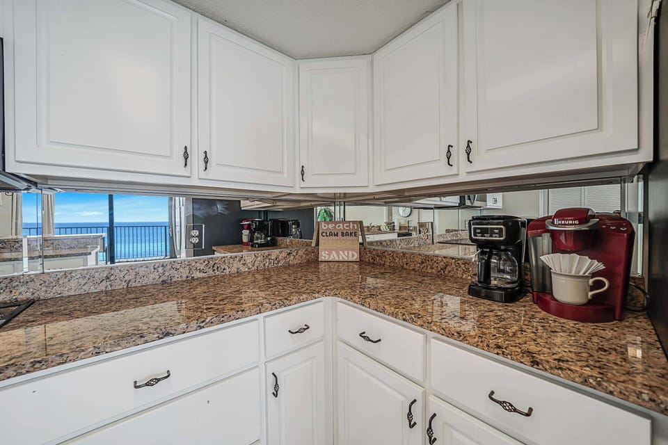 The fully equipped kitchen features granite countertops and has everything you need to prepare meals for family and friends.