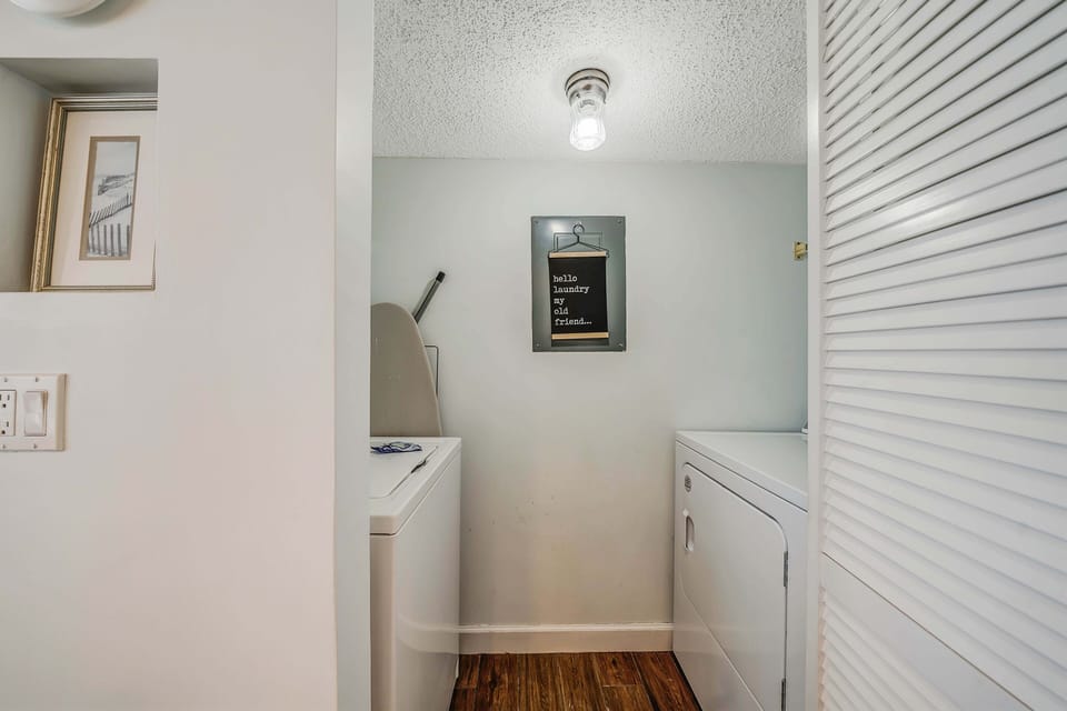 There is also a laundry room with washing machine and dryer inside the unit.