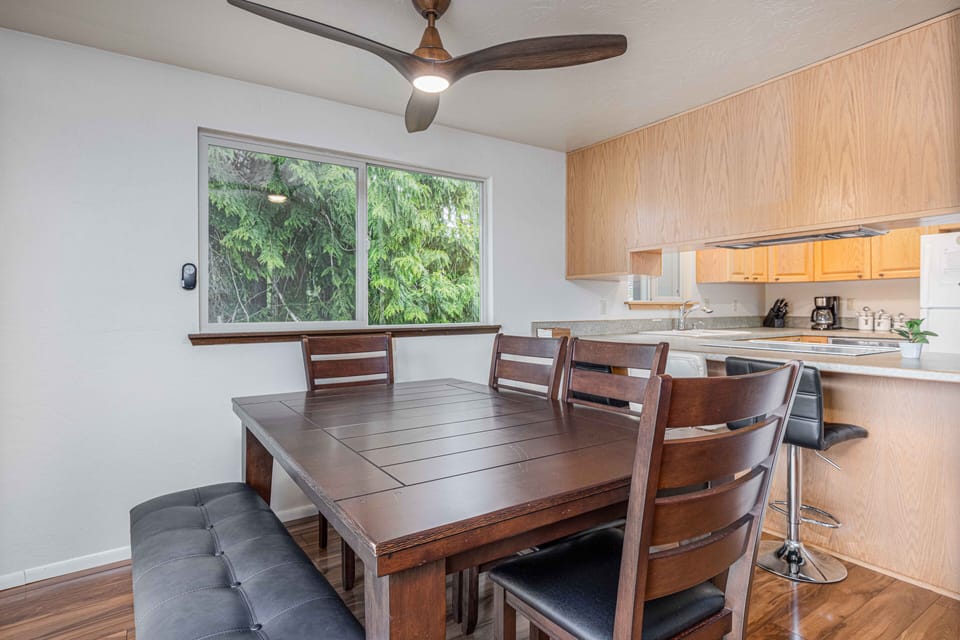 Dining table with extended leaf available.