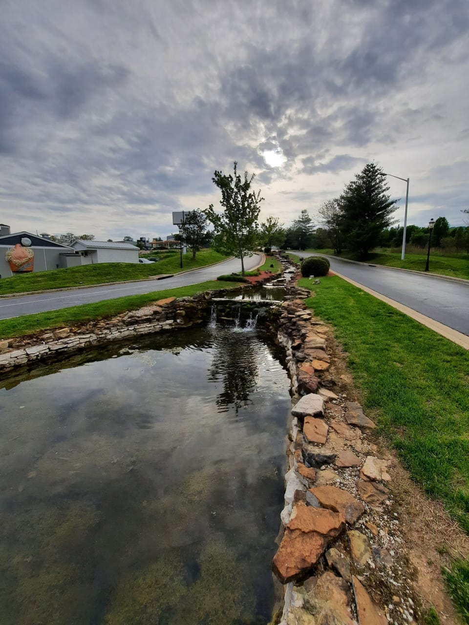 Beautifully landscaped stream throughout entrance to the community!