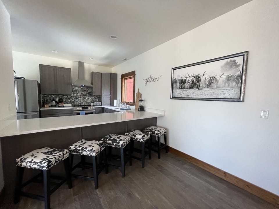 Custom kitchen with tea kettle, complimentary Senseo Coffee and large pantry.