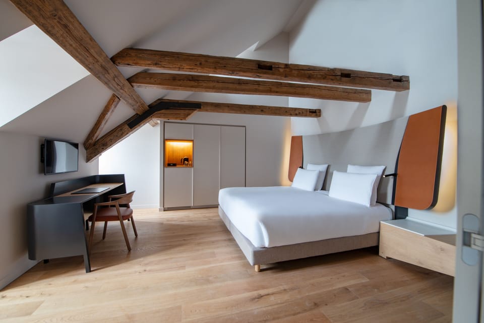 Junior Triple Room | Minibar, in-room safe, desk, soundproofing