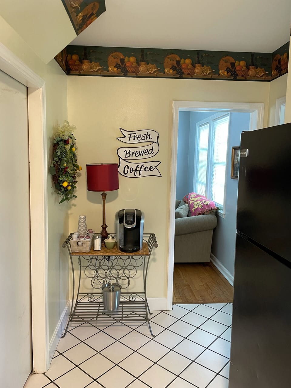 Coffee bar with a Keurig and on the counter is a regular coffee pot