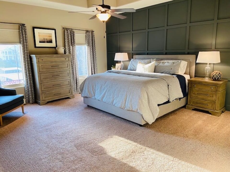 Large primary bedroom on first floor with King bed