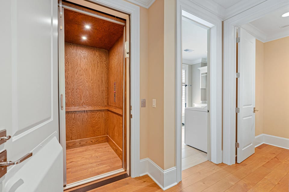 A rare and highly desirable feature, the home includes a private elevator providing convenient access between levels.